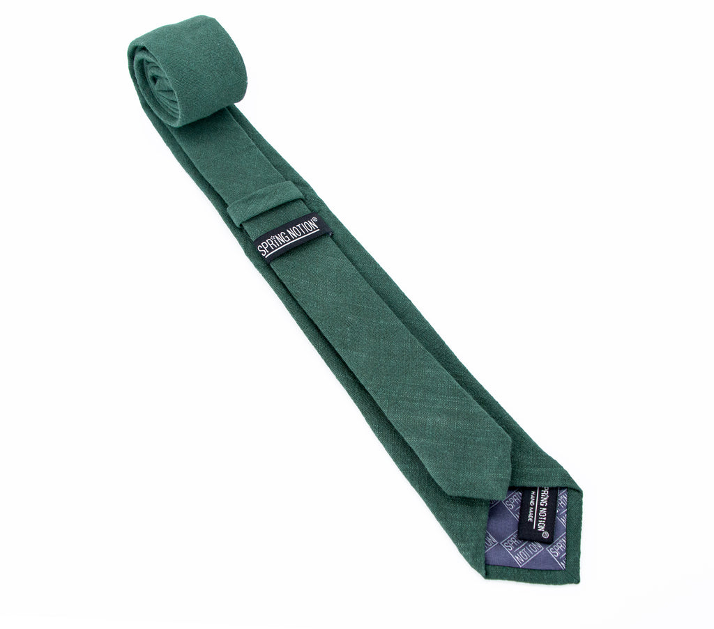 men's skinny forest green linen tie with Spring Notion branding