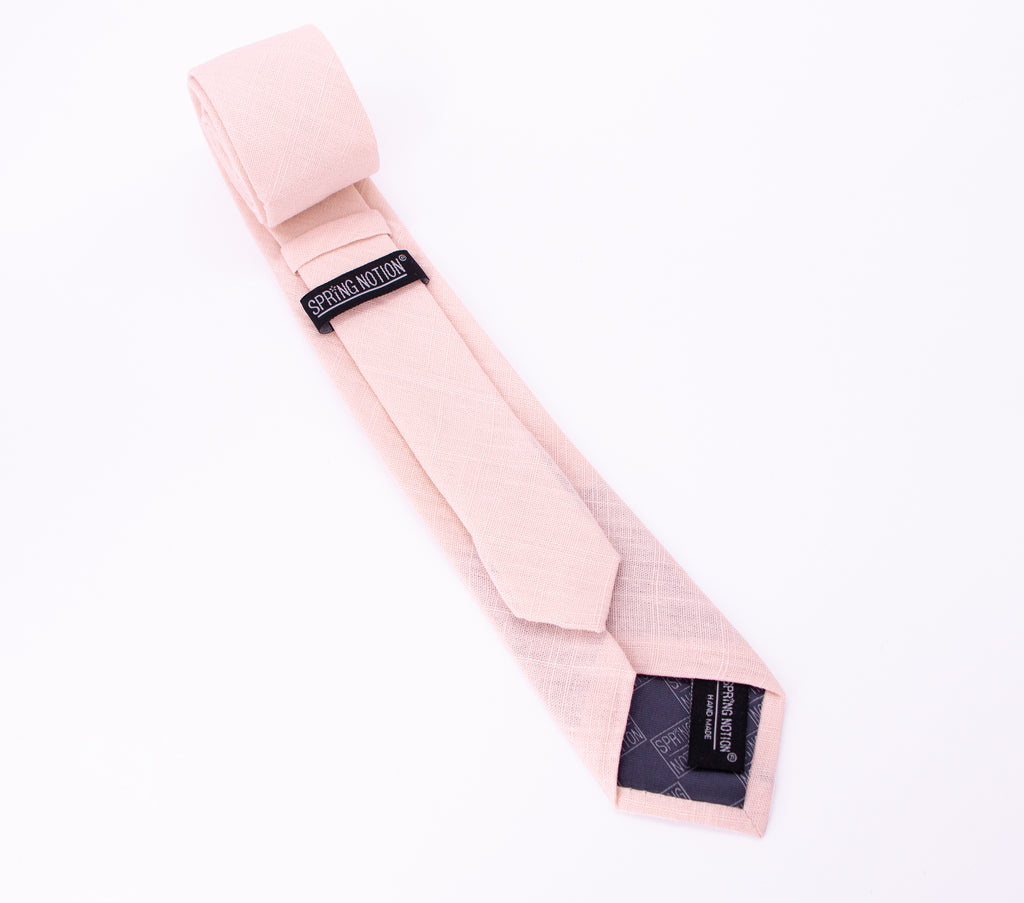men's skinny blush pink linen tie with Spring Notion branding