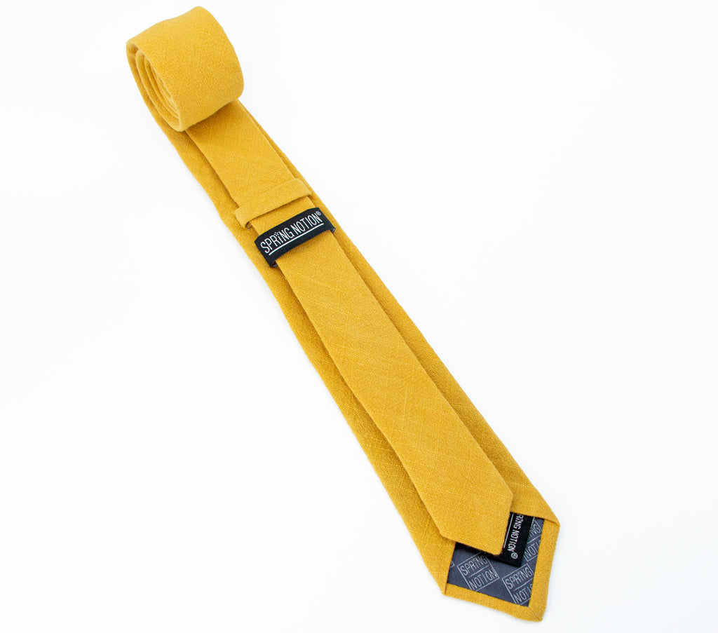men's skinny mustard yellow linen tie with Spring Notion branding