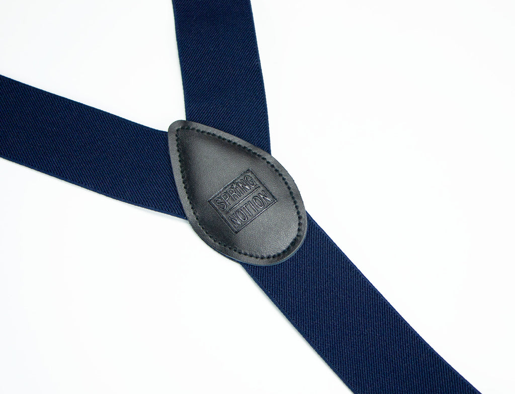 men's navy blue elastic stretch suspenders with genuine leather crosspatch with subtle Spring Notion branding