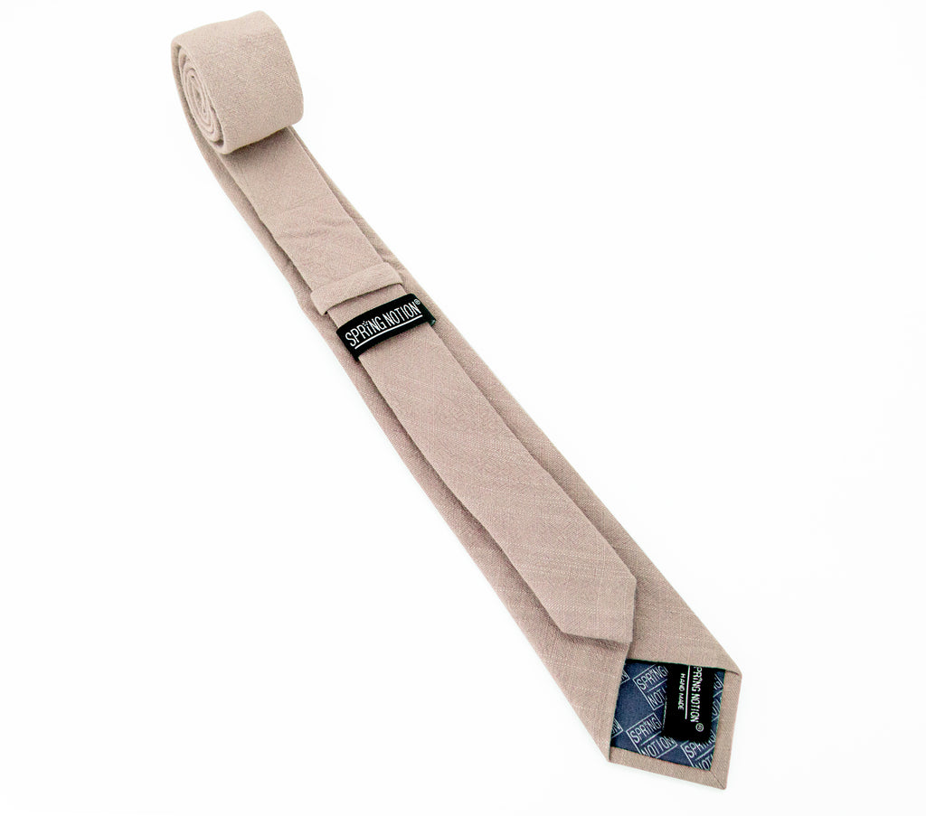 men's skinny tan linen tie with Spring Notion branding